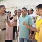 Apartment residents protest over sewerage problems and traffic chaos